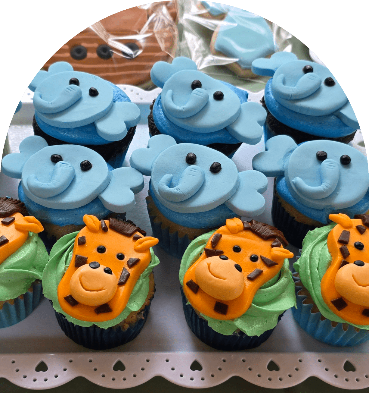 Blue and green animal cupcakes