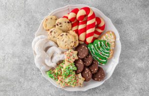 Assorted holiday cookies on a white plate