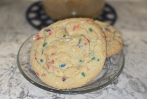 Close-up of colorful chocolate chip cookies on a plate.